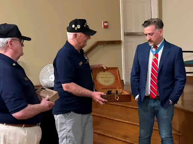 From left to right: Kent Weston presenting Paver and Tom Rinehart presenting new 1941 US Navy Bearing Circle to David Bellavia, the only surviving Medal of Honor recipient from Iraq War