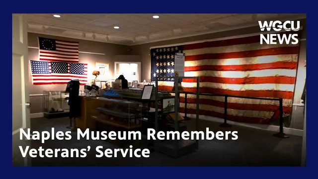 Video still: the museum gallery, with a large Civil War–era American flag and display cases